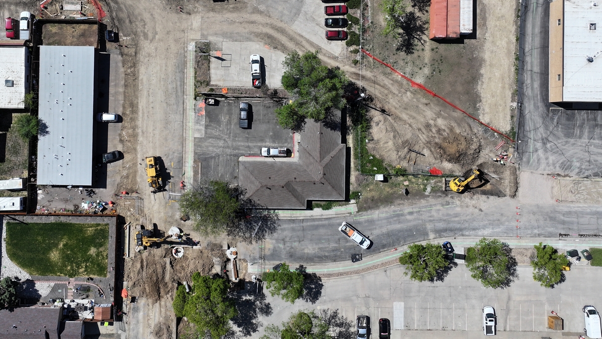 05-19-26 b Aerial picture looking down on work being done on Reed St.